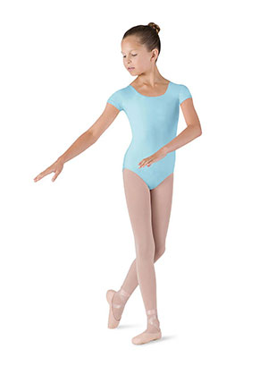 Young girl doing ballet in pastel blue leotard